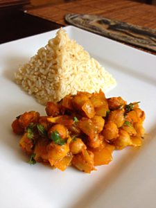 Steamed brown basmati rice with chick peas curry