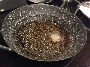Heat canola oil in a deep pan for deep frying on medium heat