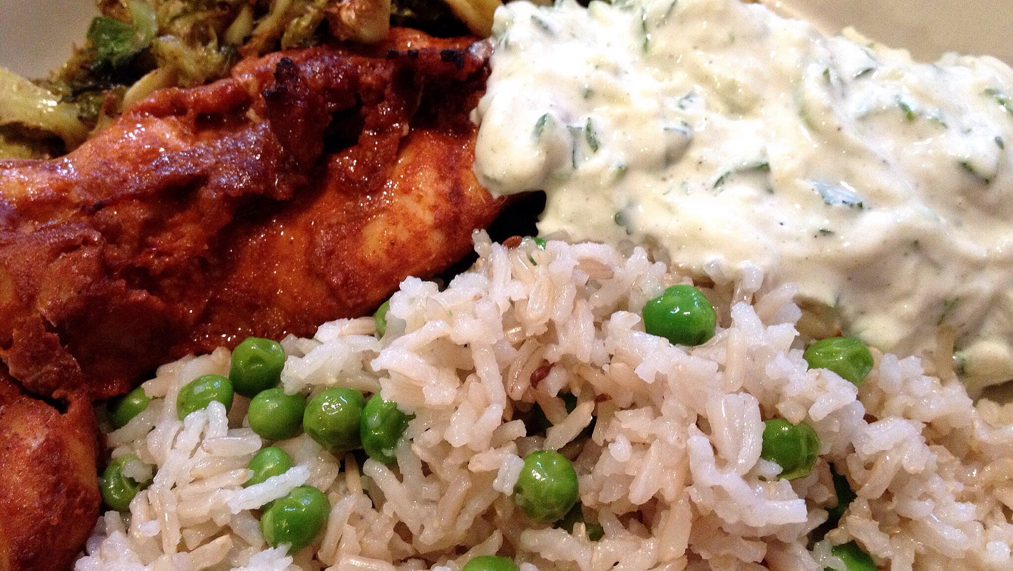 Zucchini & Mint Raita with Indian-style grilled chicken and steamed basmati rice with sweet green peas