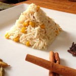 Coconut corn pulau: basmati rice with whole spices, coconut milk, and sweet corn