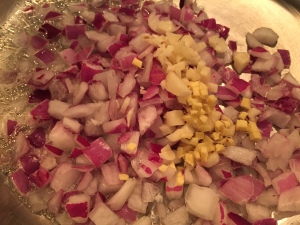 Chopped onions, finely minced garlic and fresh ginger root
