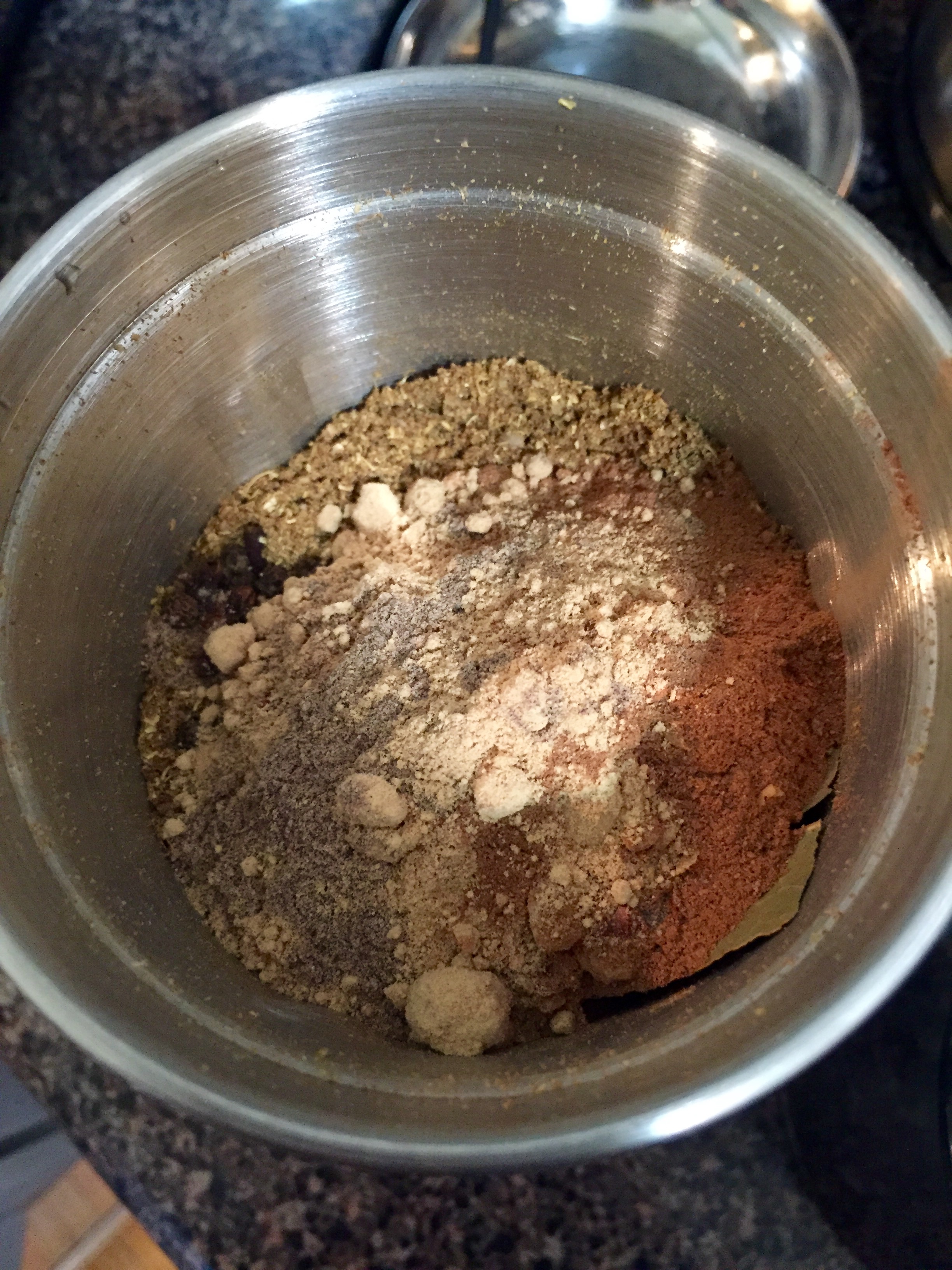 Grinding Indian spices for slow cooked short ribs