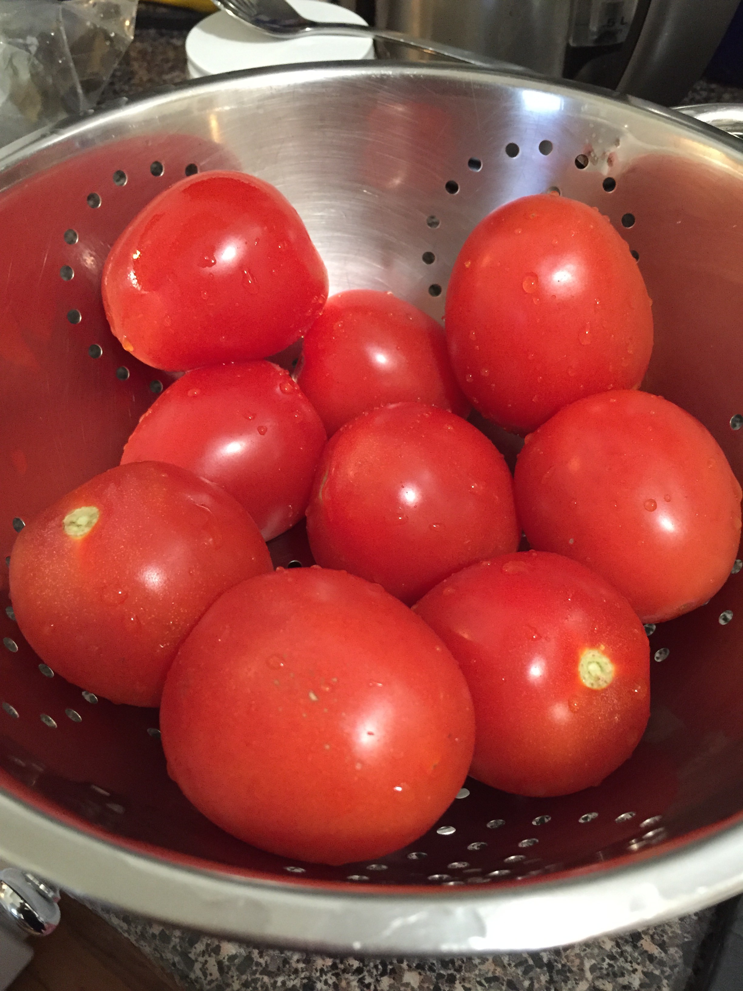 Signs of summer: fresh, red tomatoes
