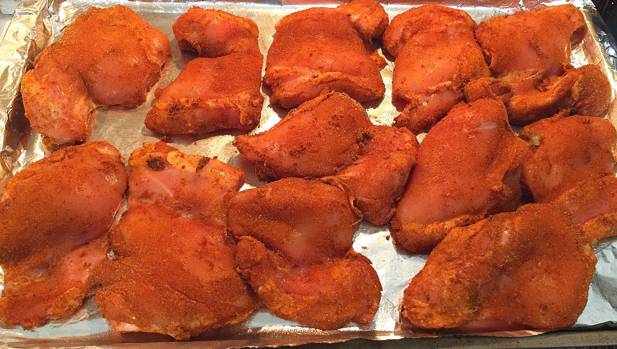 Chicken thighs coated with Indian spice rub
