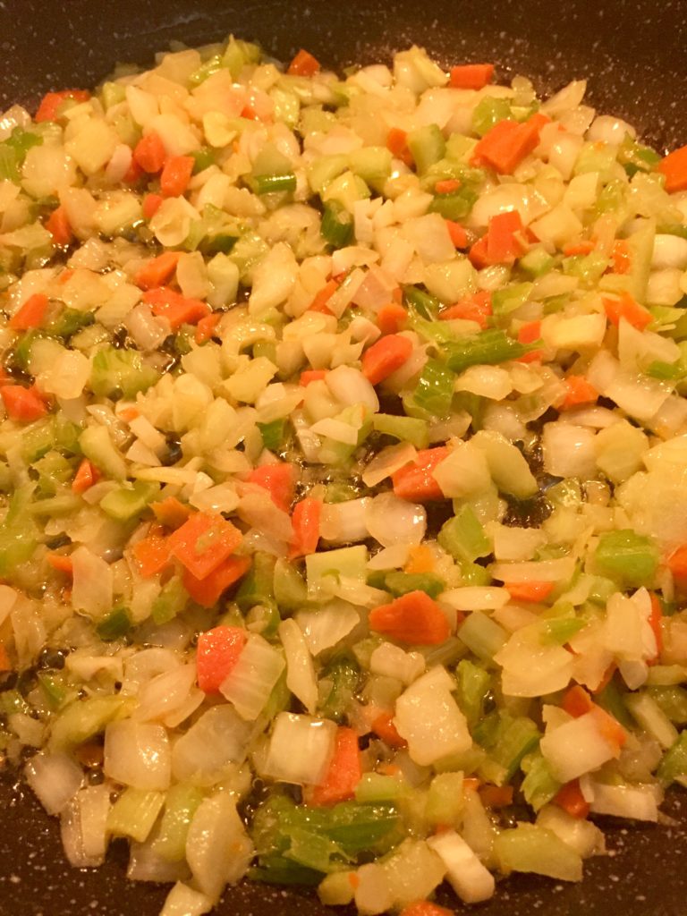 Sautéed chopped onion, carrots, celery, and garlic