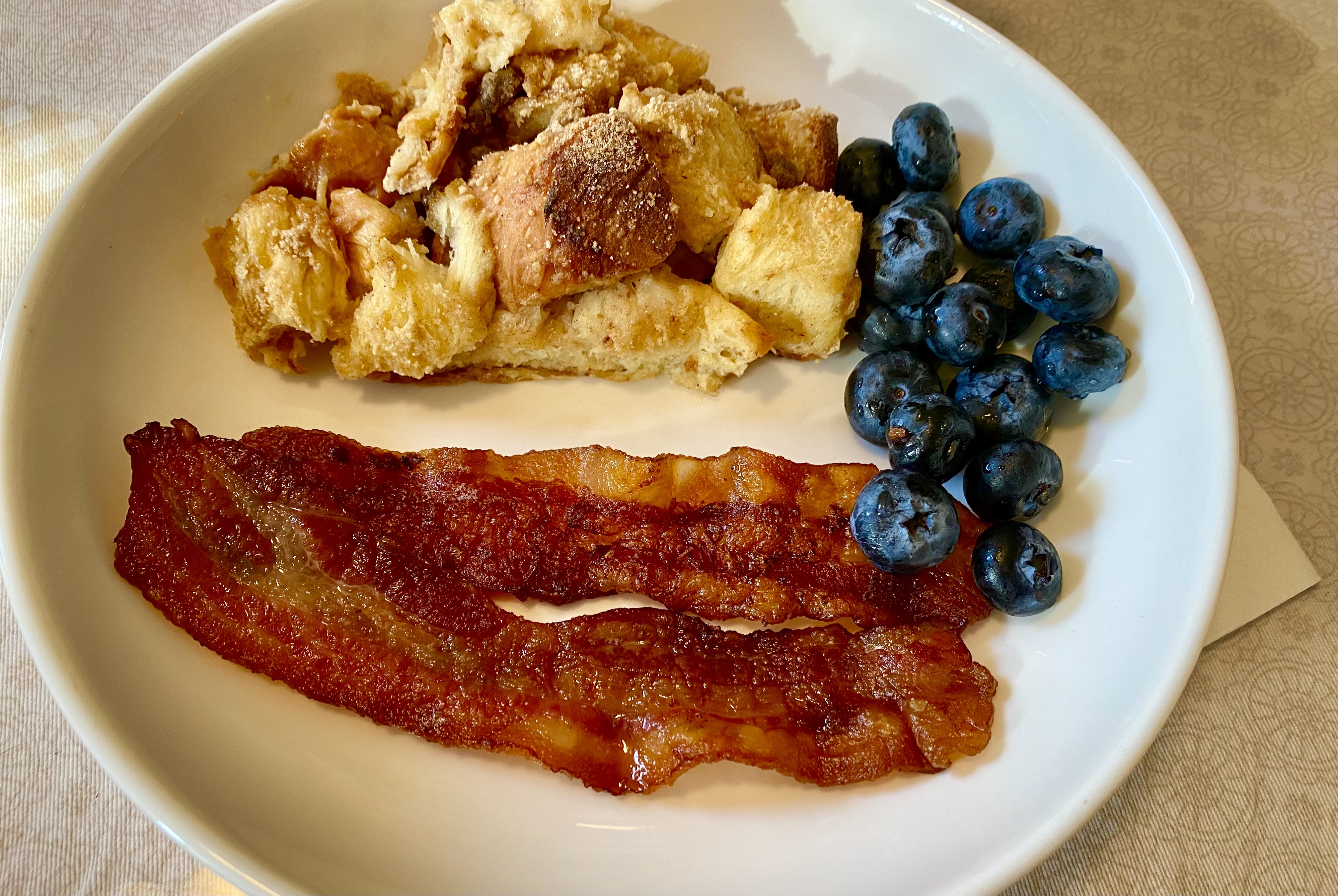 Overnight brioche French Toast Casserole with bacon and blueberries